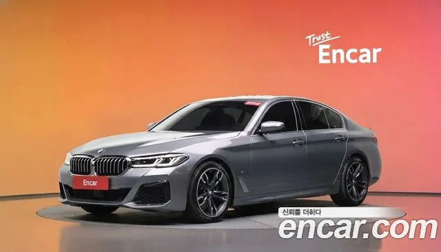 BMW 5-Series 2023 — photo 1