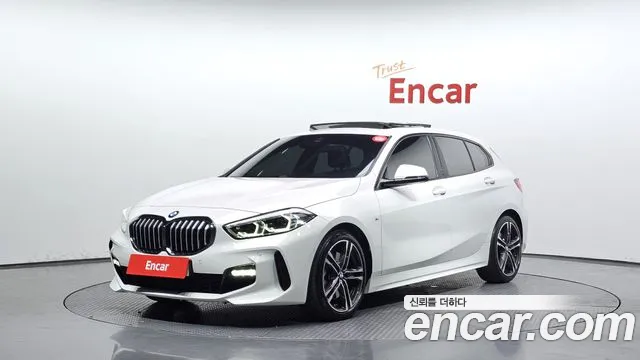 BMW 1-Series 2023 — photo 1