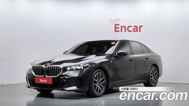 BMW 5-Series 2024 — photo 1