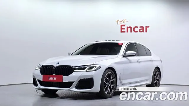 BMW 5-Series 2023 — photo 1