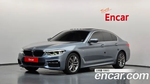 BMW 5-Series 2018 — photo 1
