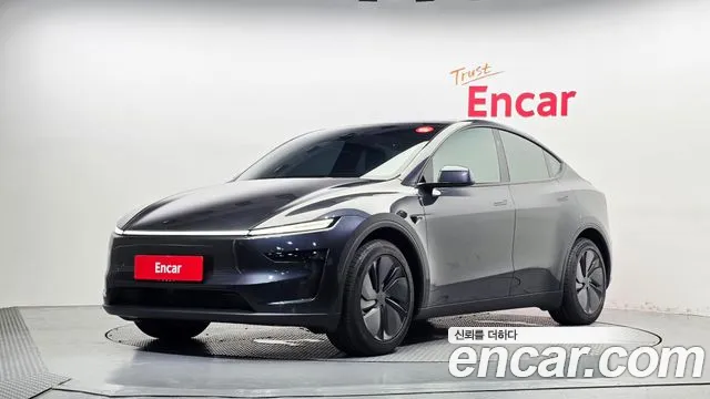 Tesla Model Y 2025 — photo 1