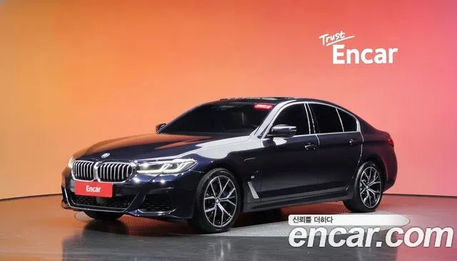 BMW 5-Series 2021 — photo 1