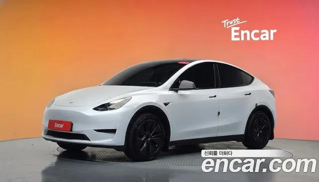 Tesla Model Y 2024 — photo 1