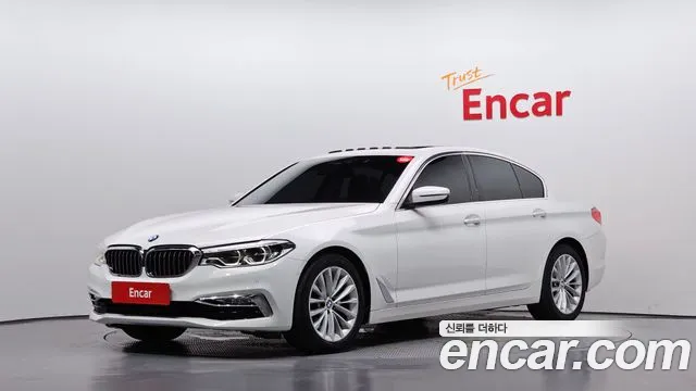 BMW 5-Series 2018 — photo 1