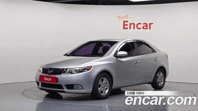 Kia Porte 2012 — photo 1