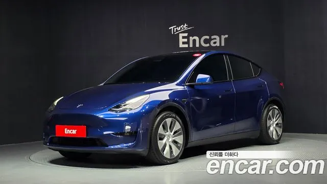 Tesla Model Y 2024 — photo 1