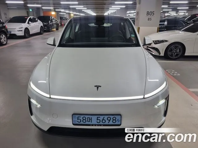 Tesla Model Y 2025 — photo 1
