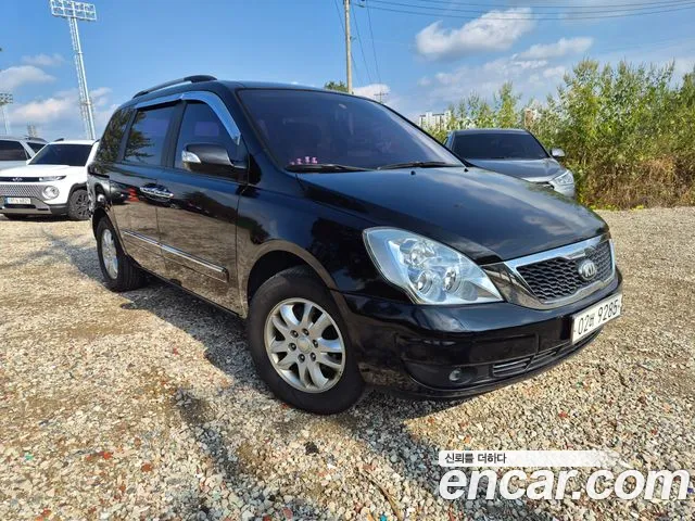 Kia Canival 2013 — photo 1