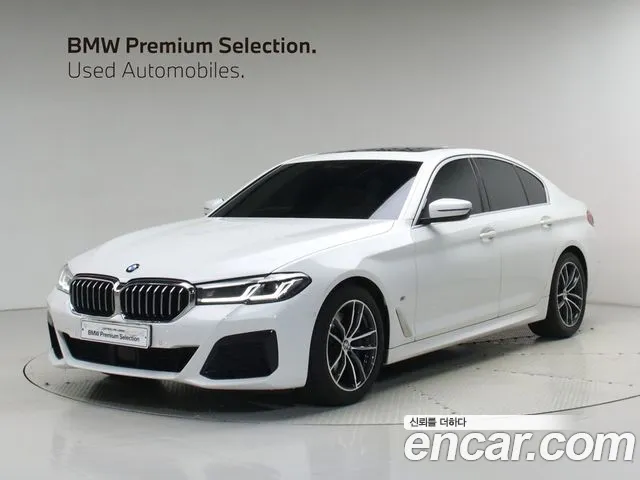 BMW 5-Series 2023 — photo 1