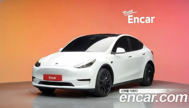 Tesla Model Y 2023 — photo 1