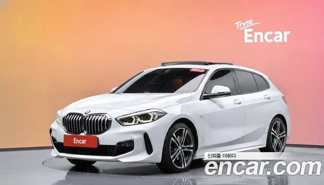 BMW 1-Series 2021 — photo 1