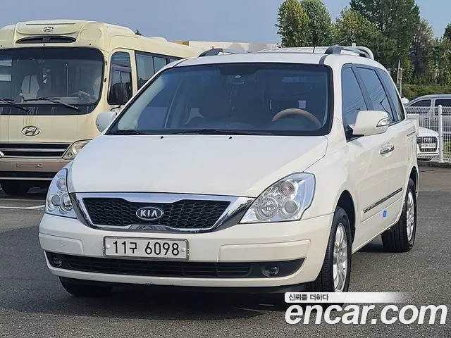Kia Canival 2012 — photo 1