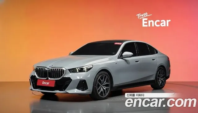 BMW 5-Series 2024 — photo 1