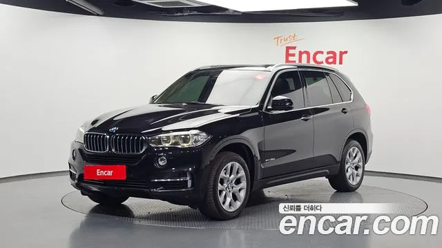 BMW X5 2015 — photo 1