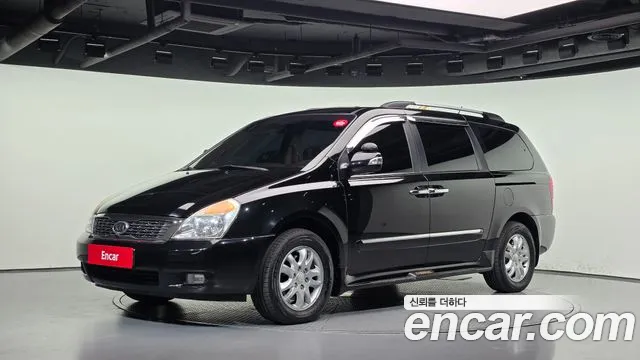 Kia Canival 2012 — photo 1