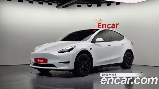 Tesla Model Y 2024 — photo 1