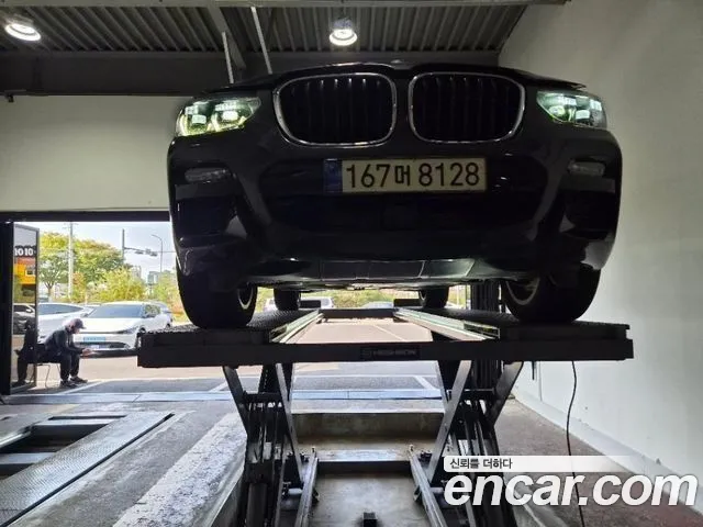 BMW X3 2021 — photo 1
