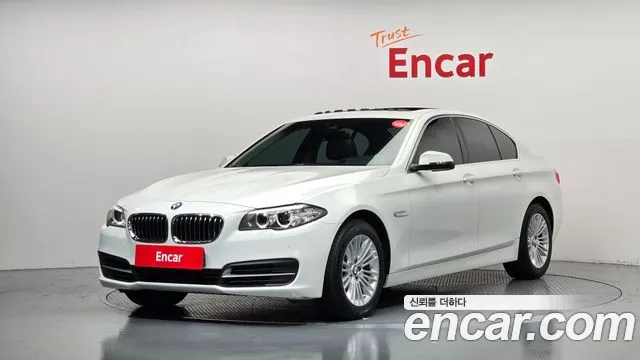 BMW 5-Series 2015 — photo 1