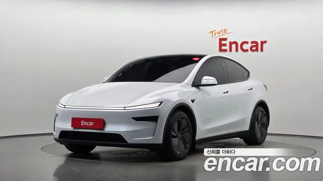 Tesla Model Y 2025 — photo 1