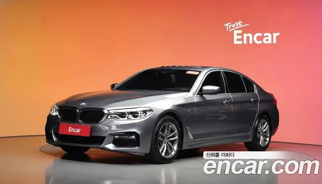 BMW 5-Series 2018 — photo 1