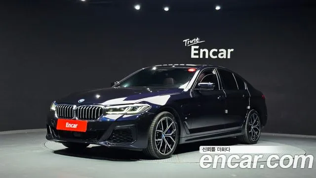 BMW 5-Series 2023 — photo 1