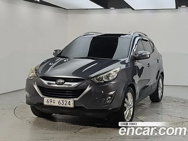 Hyundai Tucson 2012 — photo 1