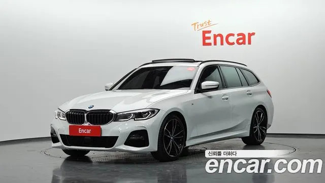 BMW 3-Series 2022 — photo 1