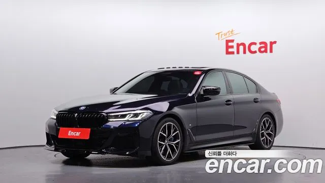 BMW 5-Series 2021 — photo 1
