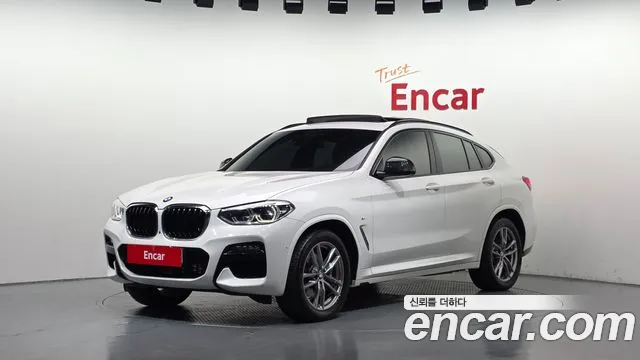 BMW X4 2021 — photo 1