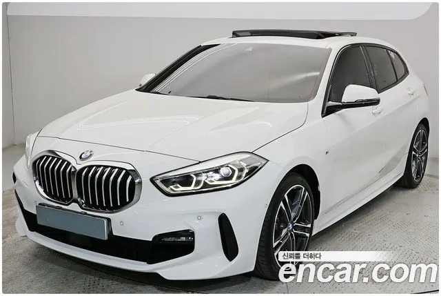 BMW 1-Series 2021 — photo 1