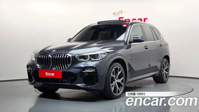BMW X5 2021 — photo 1