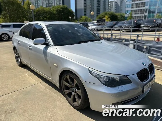 BMW 5-Series 2009 — photo 1