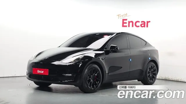 Tesla Model Y 2024 — photo 1