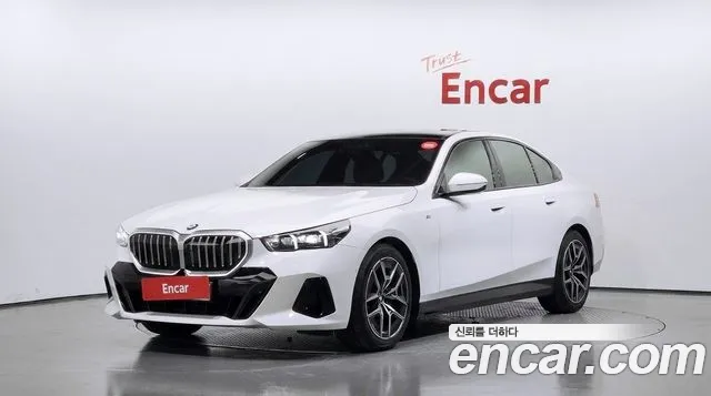 BMW 5-Series 2024 — photo 1