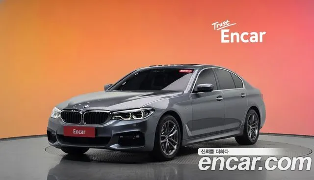 BMW 5-Series 2018 — photo 1