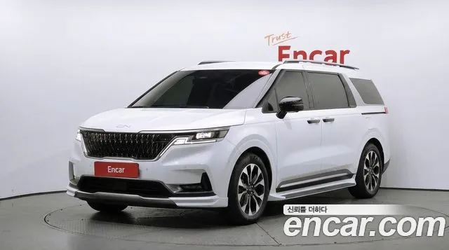 Kia Canival 2023 — photo 1