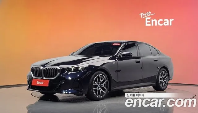 BMW 5-Series 2024 — photo 1