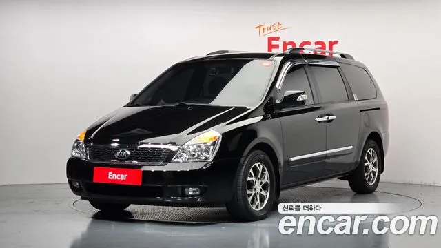 Kia Canival 2013 — photo 1