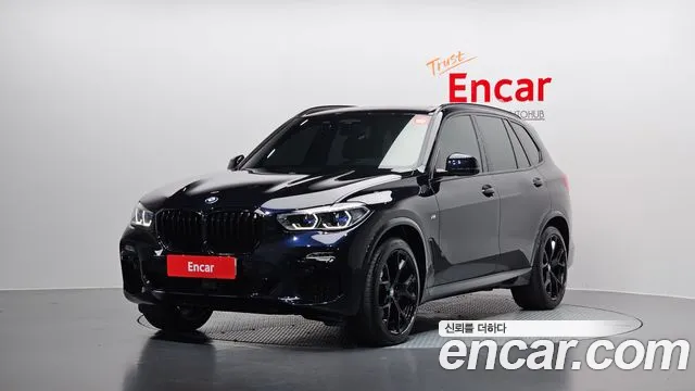 BMW X5 2021 — photo 1