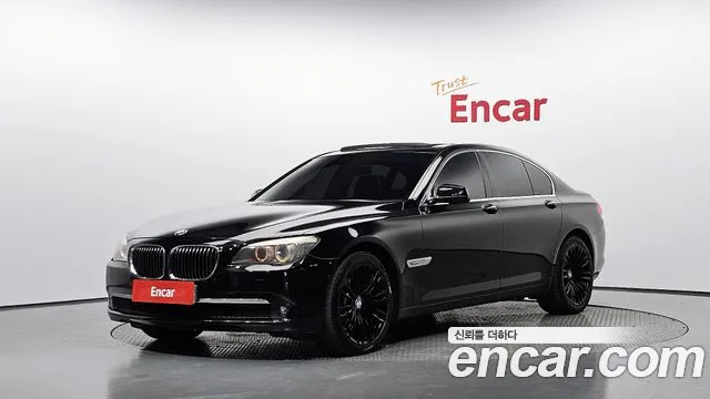 BMW 7-Series 2011 — photo 1