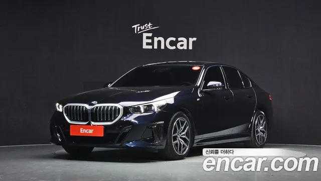 BMW 5-Series 2024 — photo 1
