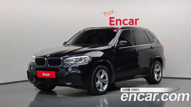 BMW X5 2018 — photo 1