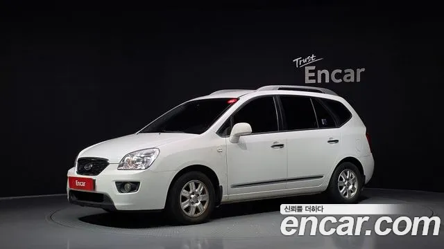 Kia Carens 2011 — photo 1