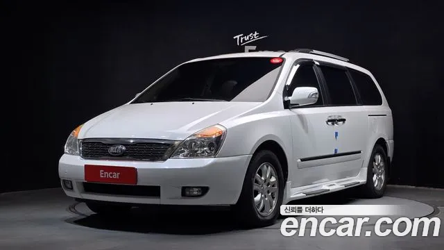 Kia Canival 2013 — photo 1