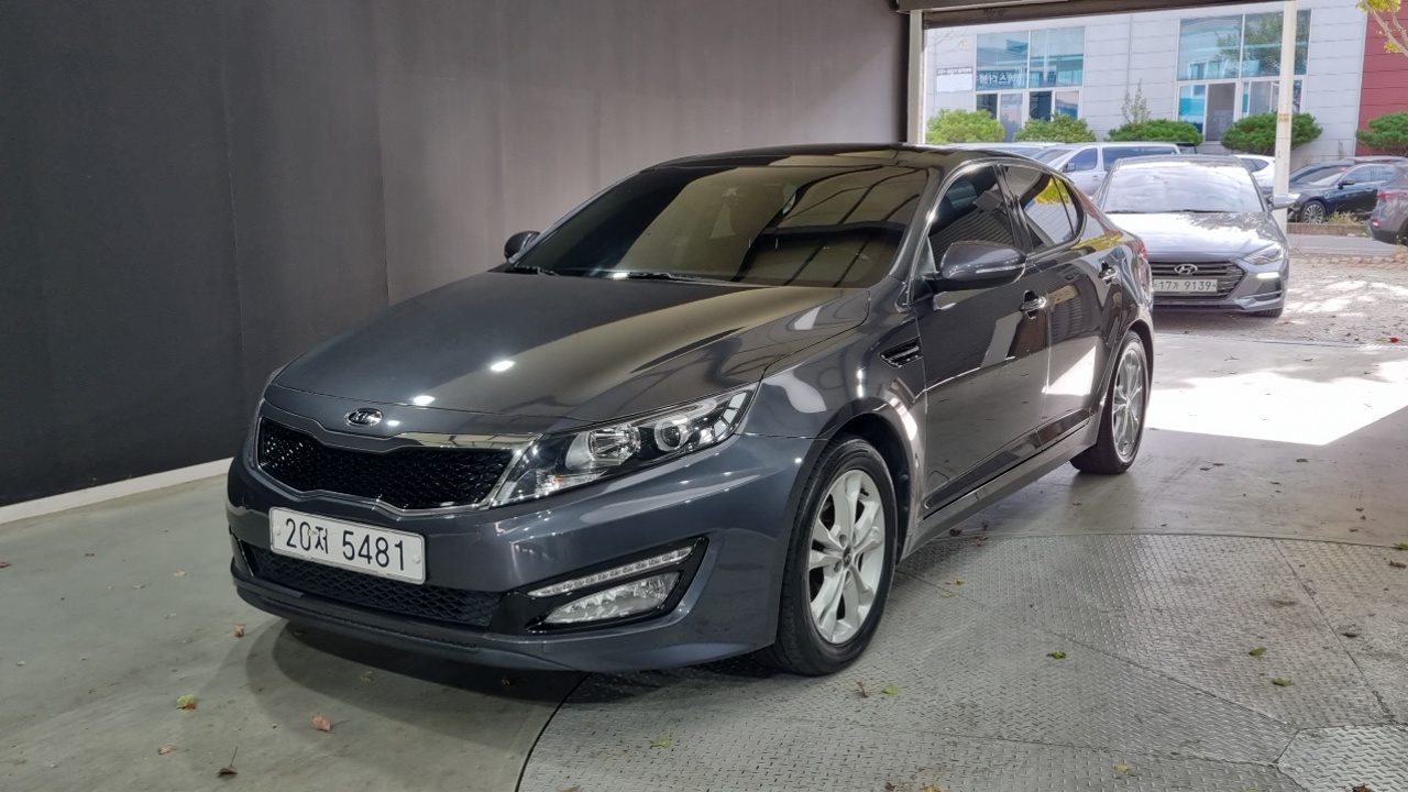 Kia K5 2012 — photo 1