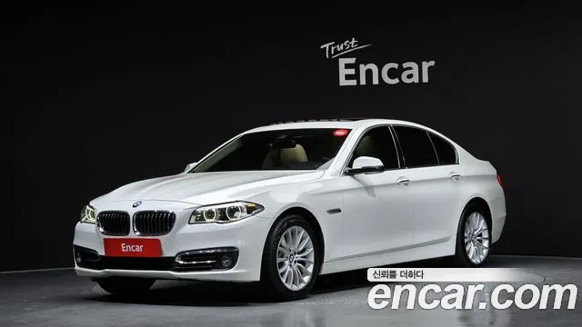 BMW 5-Series 2015 — photo 1