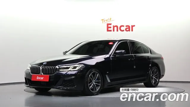 BMW 5-Series 2023 — photo 1