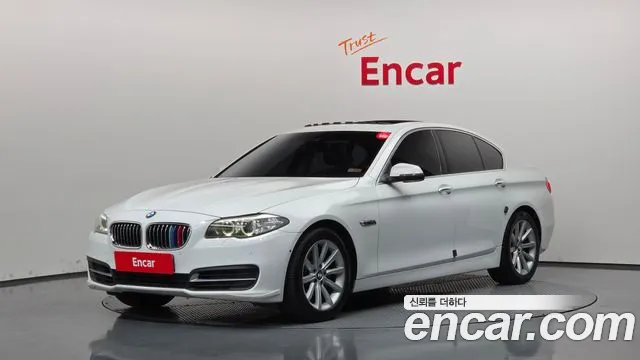 BMW 5-Series 2015 — photo 1