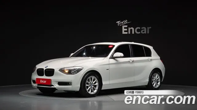 BMW 1-Series 2014 — photo 1